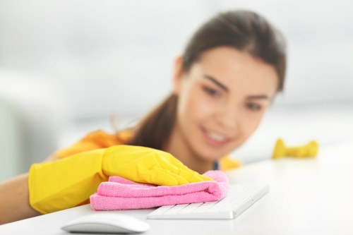 Workers reviewing a health and safety checklist for carpet cleaning